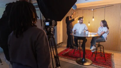 Rev. Ryan Trushenski and Katy McNew have a chat in the studio during a filming of St. Luke's Online Ministries.